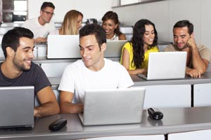 Med students in classroom with laptop