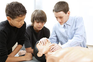 Youth Participating In CPR Instruction