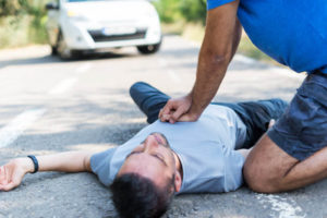 cpr-compressions-in-unconscious-man-in-the-street