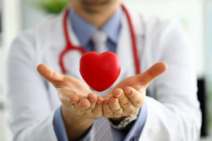 doctor-stethoscope-heart-hands