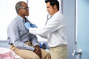 old-man-having-physical-check-up-with-a-doctor