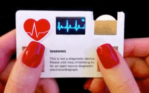 Business card with a built in electrocardiograph