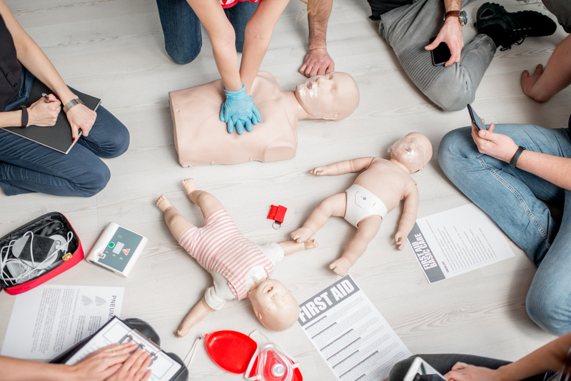 infant-adult-cpr-compressions-using-a-mannequin