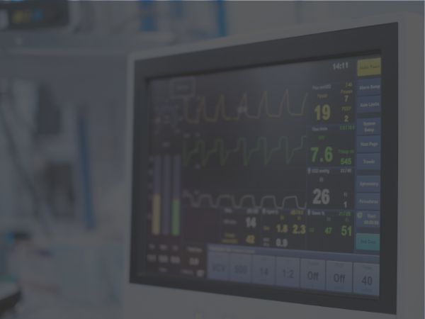 Heart monitor display showing vital signs.